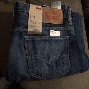 Levi 569 Loose Straight Fit size 34X34 color blue.